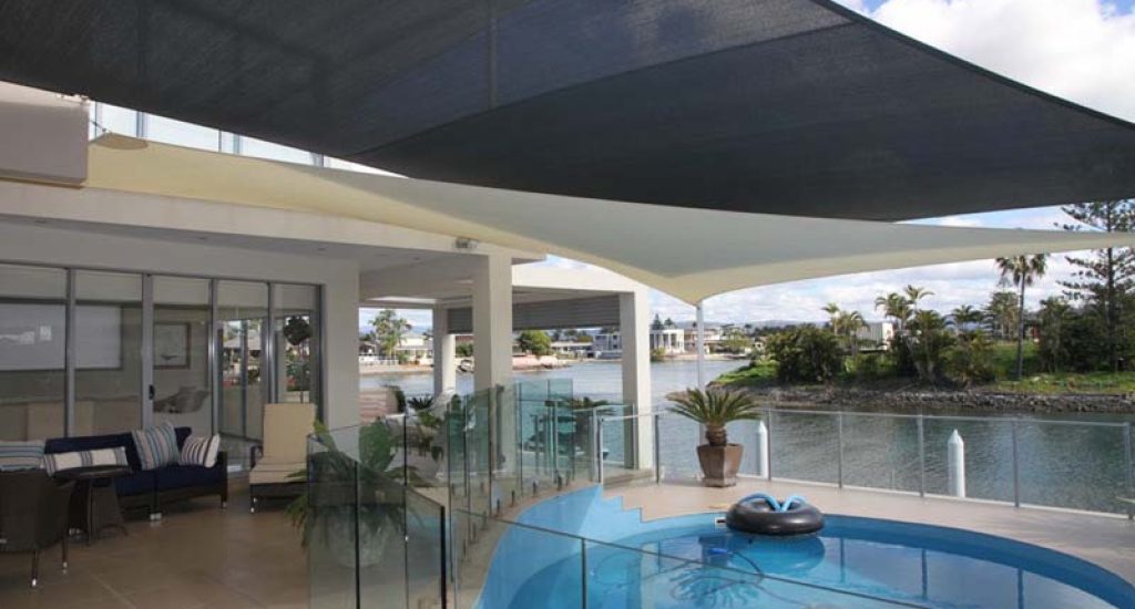 shade sails over swimming pool areas to extend usibility